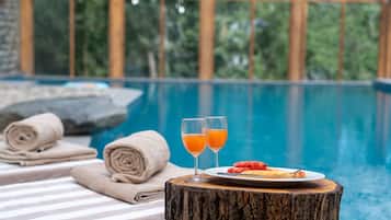 Indoor pool, free pool cabanas, pool umbrellas