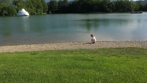 A lake with a small island labeled "Wibbit." - Experience Chiemsee, mountains & lakes - apartment for up to 4 people, 2 bedrooms, balcony (Marquartstein)