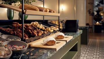 Daily buffet breakfast (EUR 28.50 per person)