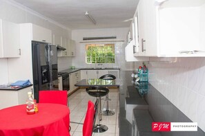 House | Private kitchen | Fridge, microwave, oven, stovetop - Captivating 16-bed House in Liwonde (Liwonde)