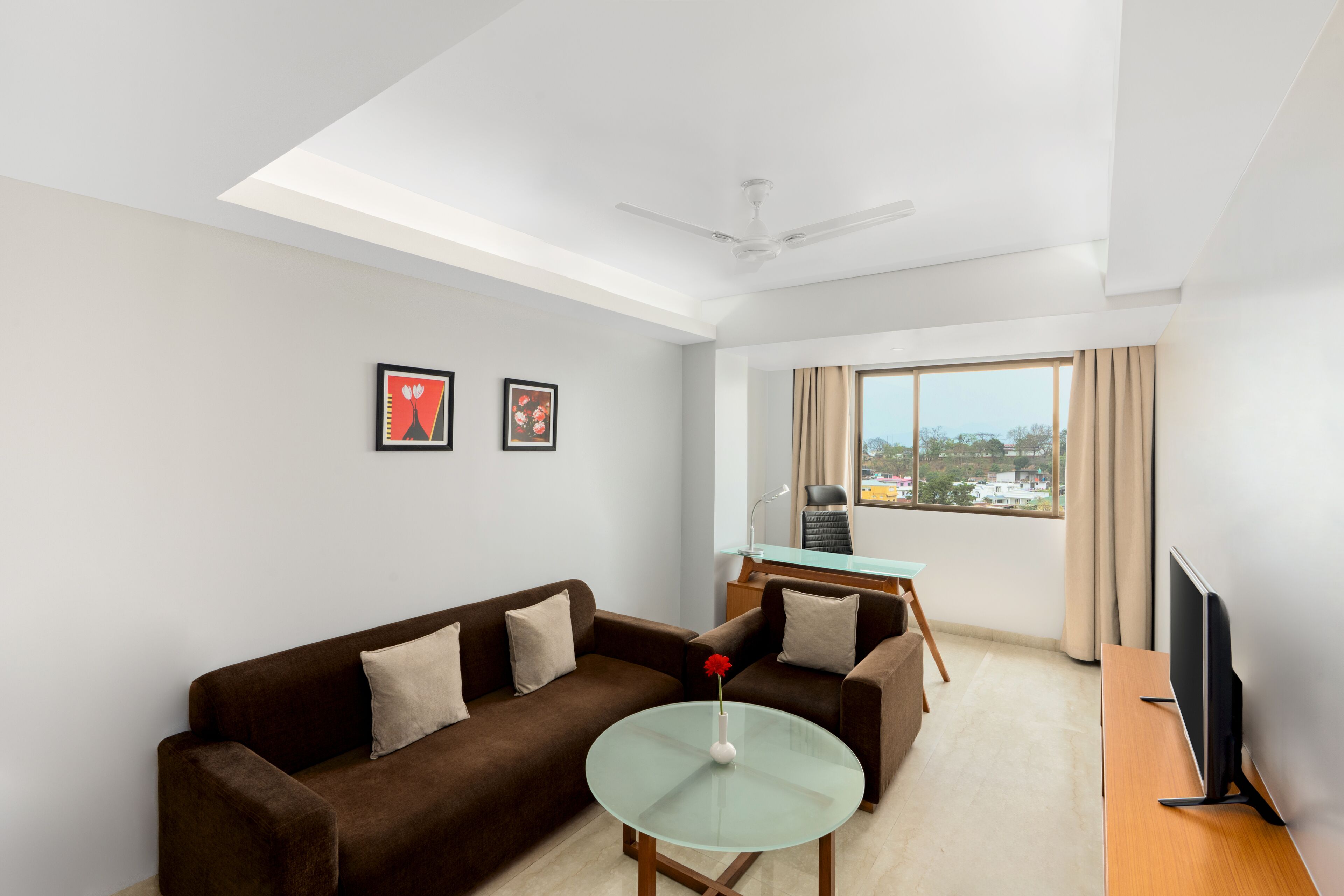 Suite, 1 chambre | Aire de séjour | Téléviseur à écran plat