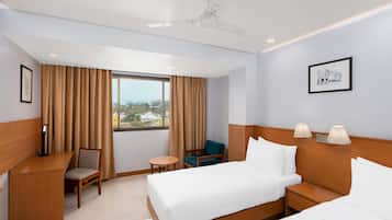 Superior Room | Minibar, in-room safe, desk, laptop workspace
