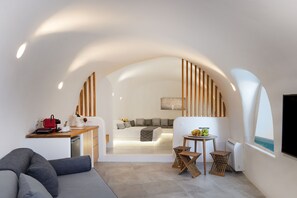 Panoramic Studio Suite, 1 King Bed with Sofa bed, Jetted Tub, Sea View | Private kitchen | Mini-fridge, microwave, coffee/tea maker, electric kettle - San Martino cave villas (Santorini)