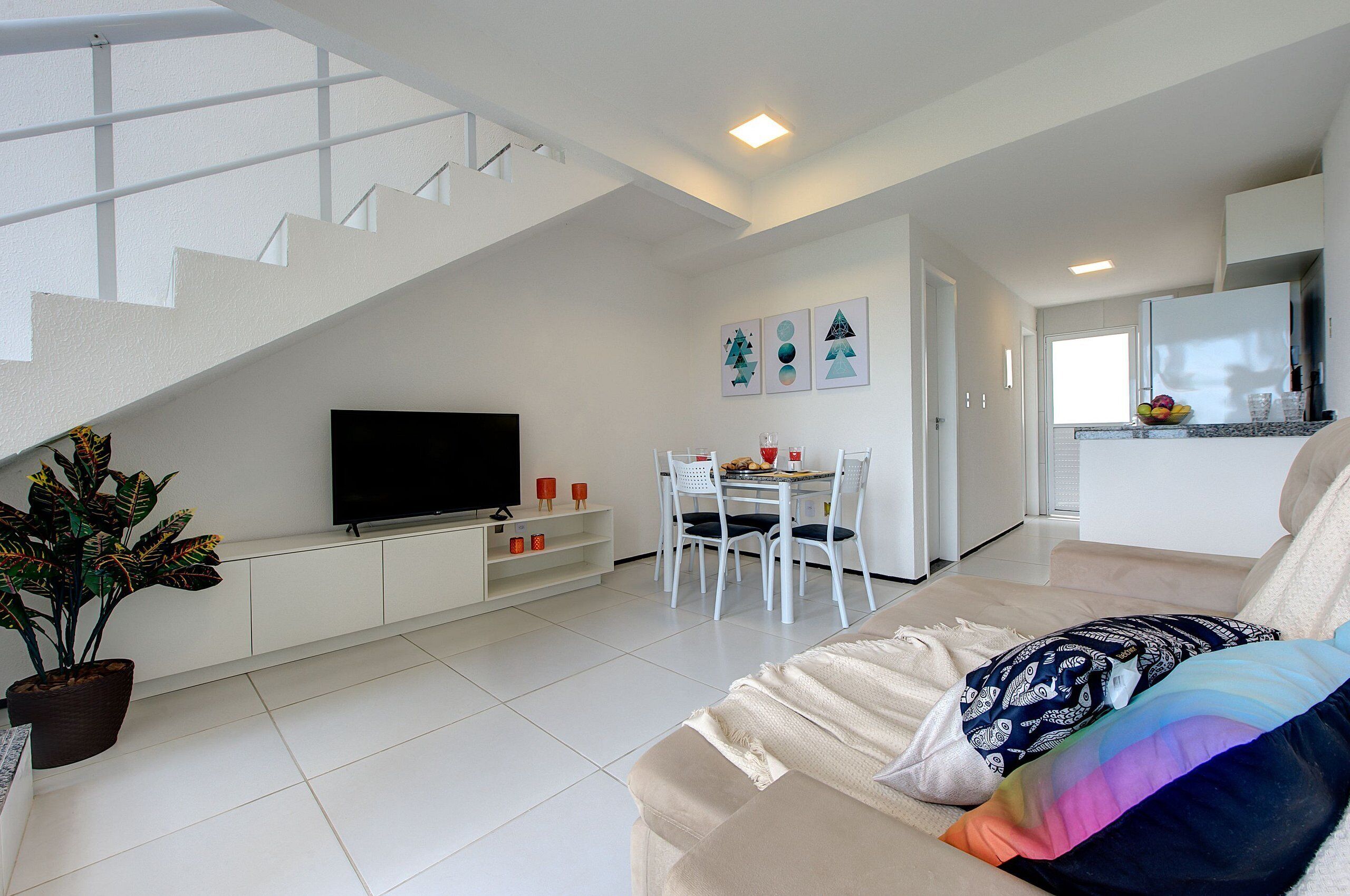Duplex família | Área de estar | TV de tela plana