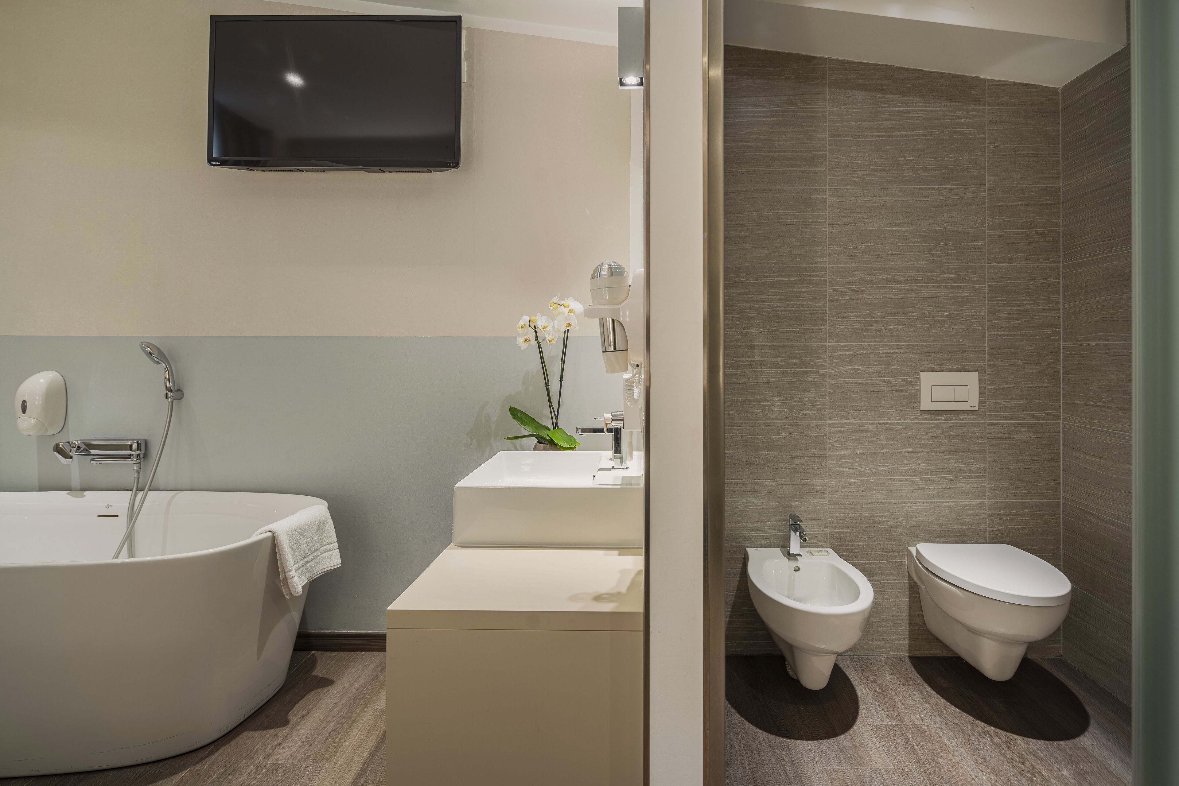 comfort double or twin room | bathroom | shower, rainfall showerhead, hair dryer, towels