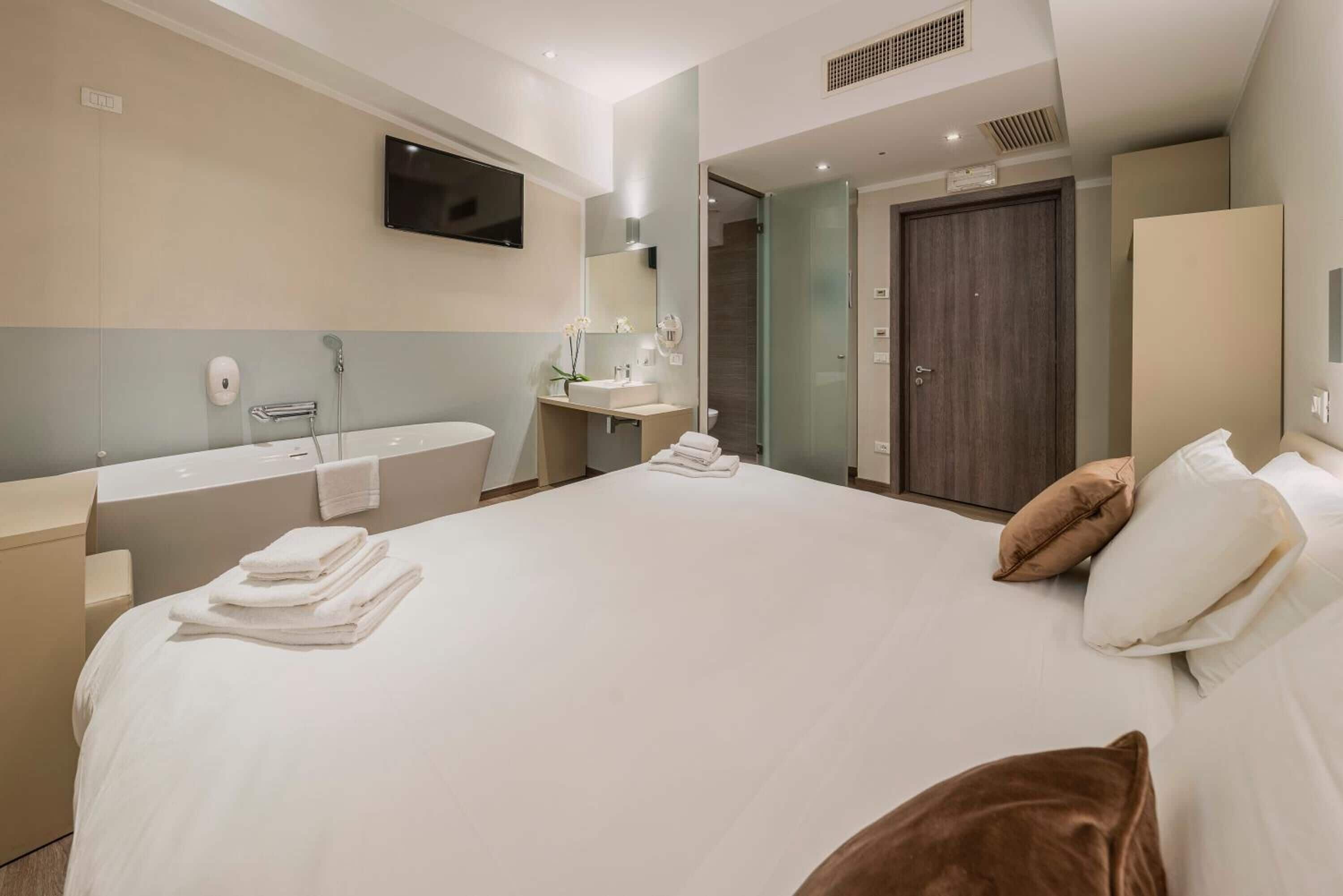 comfort double or twin room | in-room safe, desk, laptop workspace, blackout curtains