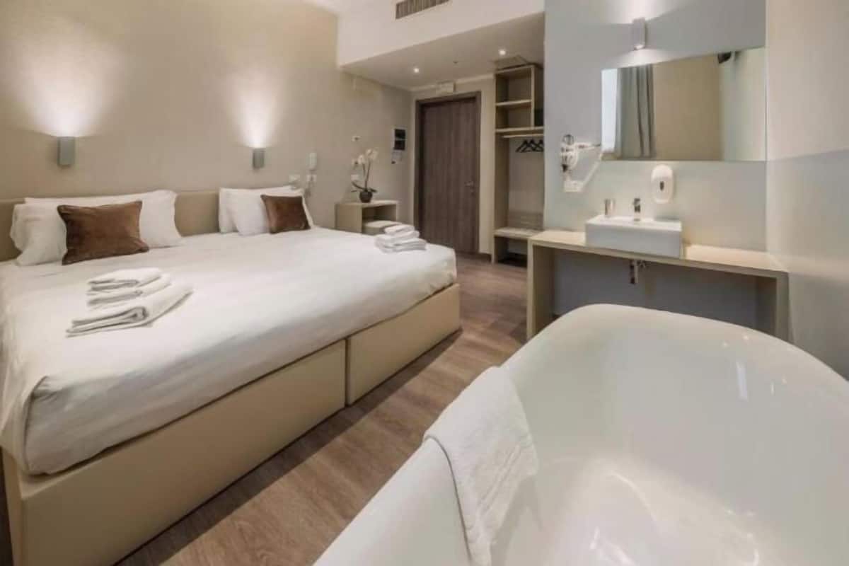 In-room safe, desk, laptop workspace, blackout curtains
