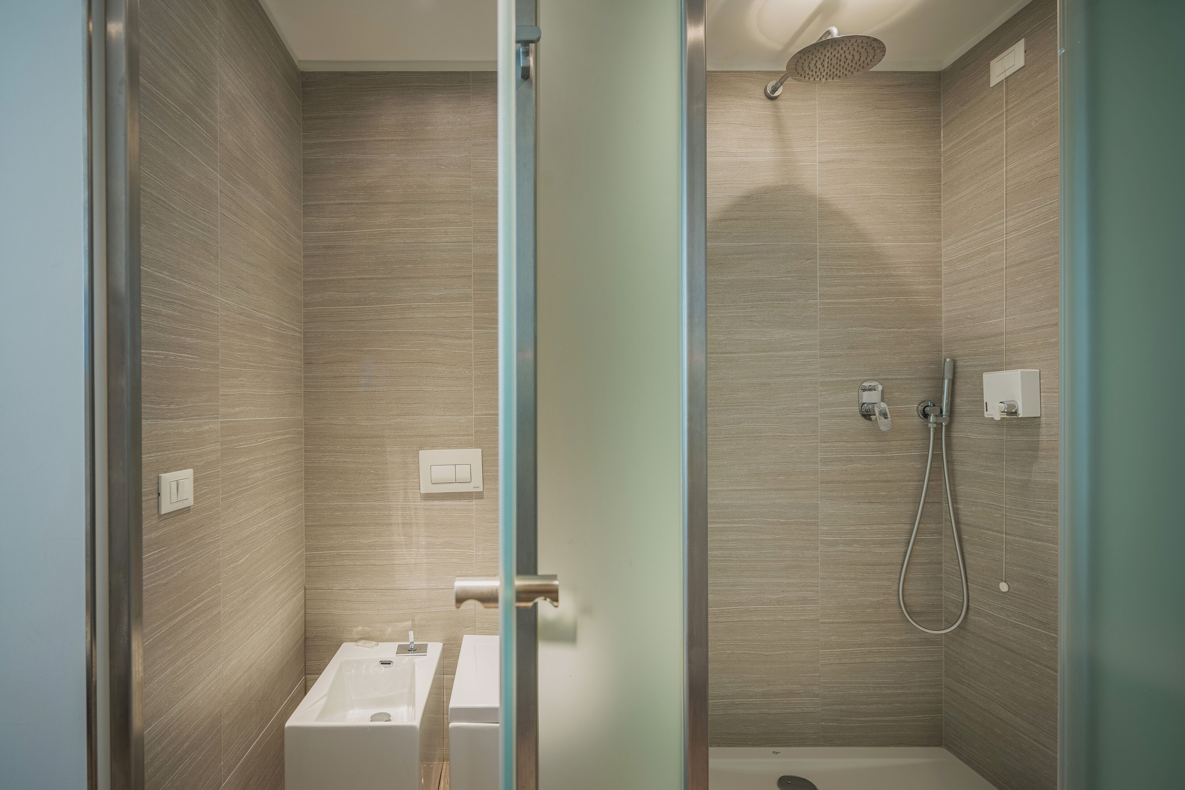 double or twin room | bathroom | shower, rainfall showerhead, hair dryer, towels