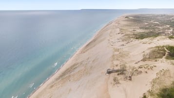 Na praia, toalhas de praia