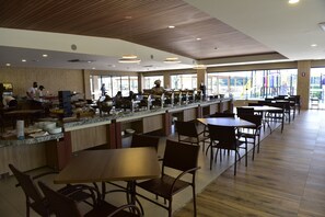 Enjoy a comfortable dining experience with ample seating and a variety of food and beverage options.