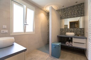 Shower, hair dryer, towels, soap