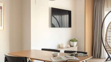 Apartment, 1 Bedroom | Living area | Flat-screen TV