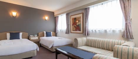 Twin Room Deluxe, Non Smoking | Down duvets, desk, free WiFi, bed sheets