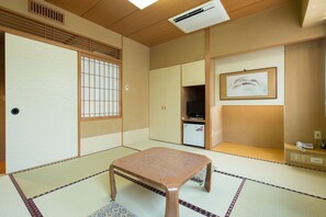 Japanese Room up to 3 guests, Non Smoking | Living area | 28-inch flat-screen TV with digital channels, TV