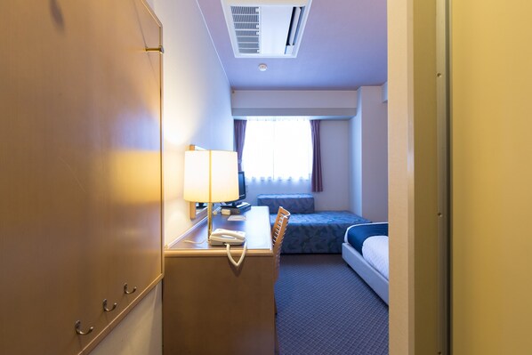 Down comforters, desk, free WiFi, bed sheets