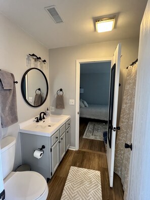 Combined shower/bathtub, hair dryer, towels, soap