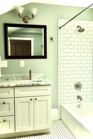 Bathtub, hair dryer, towels