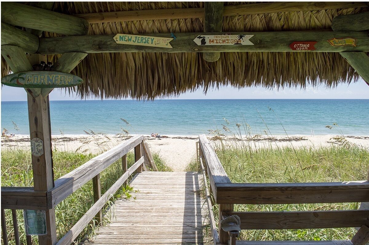 On the beach, sun loungers, beach towels
