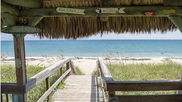 On the beach, sun loungers, beach towels
