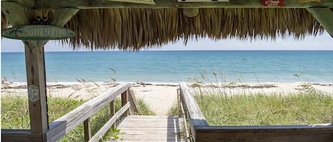 On the beach, sun loungers, beach towels