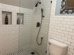 Combined shower/tub, hair dryer, towels, soap