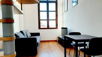 Comfort maisonnette | Woonruimte | Een plasmatelevisie