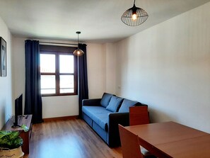 Appartement Classique | Coin séjour | Télévisions à écran plasma