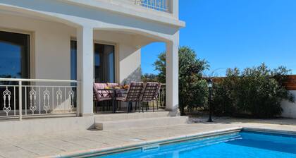 Luxury villa on mountainside with sea views and private pool & garden