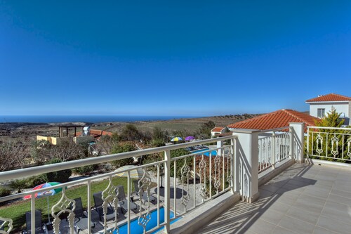 Luxury villa on mountainside with sea views and private pool & garden