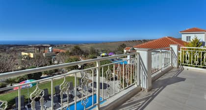 Luxury villa on mountainside with sea views and private pool & garden