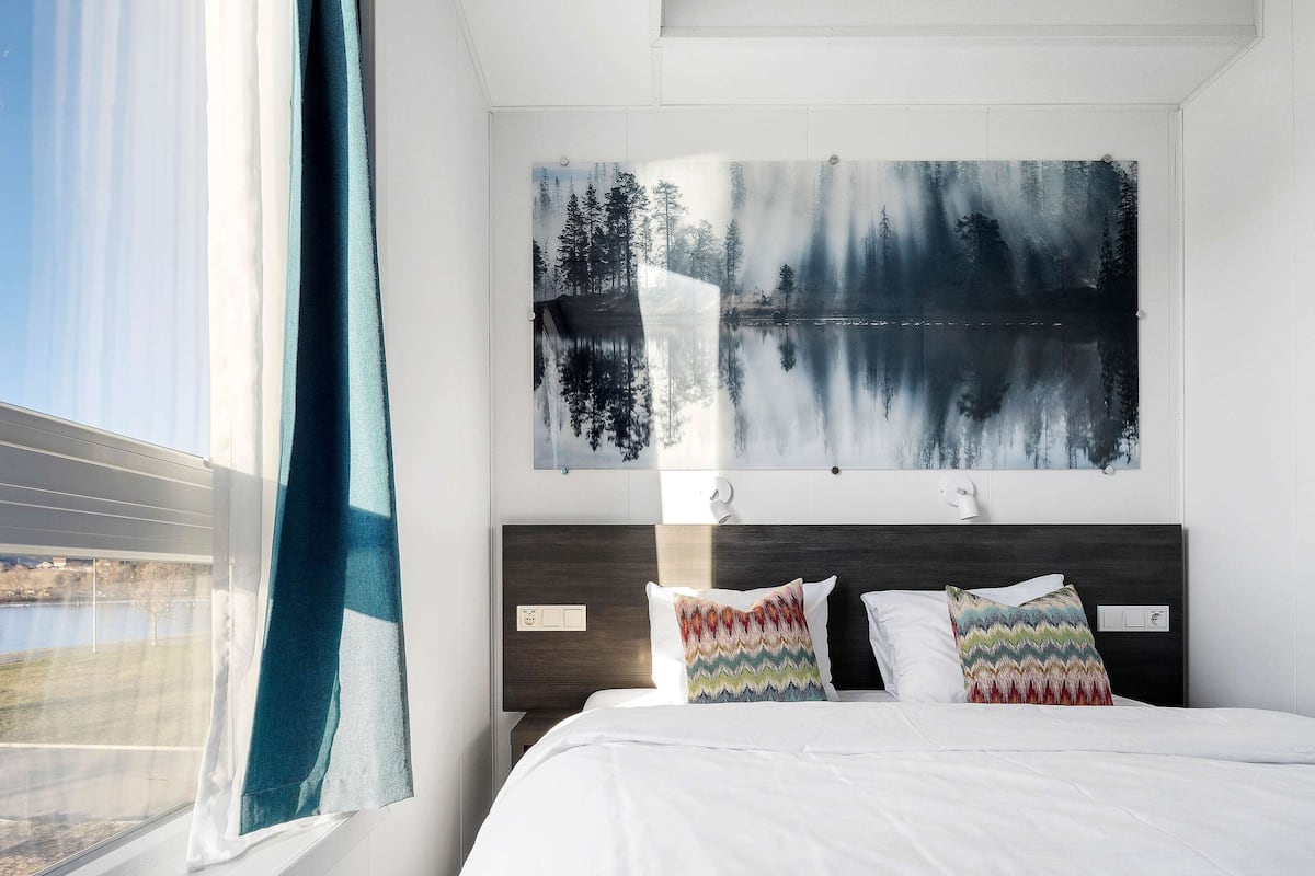 Pillow-top beds, desk, laptop workspace, soundproofing