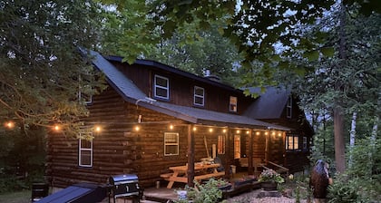 The perfect ADK log cabin getaway on 4 acres and 5 min. to town!