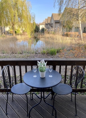 Enjoy a water garden view from the front terrace