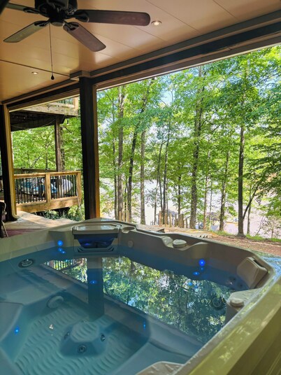 6 bed Pontoon Boat and jet ski rental, hot tub, pool table, trampoline & more