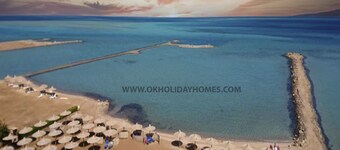 OK HOLIDAY HOMES .A5.8.