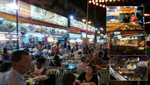 A bustling street food market with multiple food stalls and seated diners. - Citi Hotel @KL Sentral (Kuala Lumpur)
