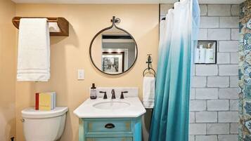 Shower, eco-friendly toiletries, hair dryer, towels