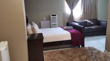 Premium bedding, down comforters, pillowtop beds, minibar