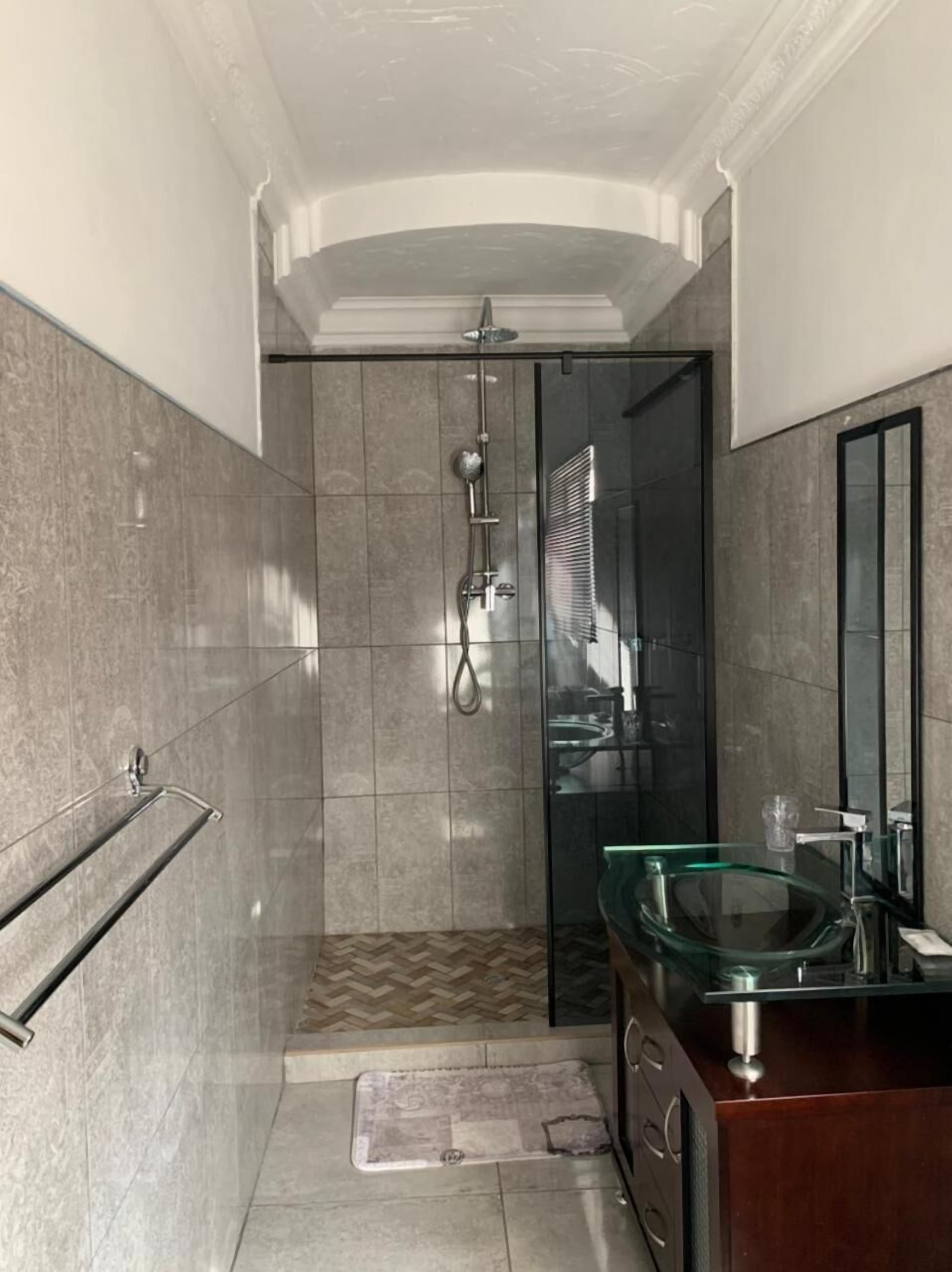 Shower, rainfall showerhead, towels