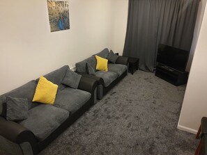 House | Living room | 30-inch TV with digital channels