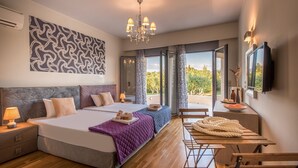 A modern hotel room with a large bed, a desk, and a balcony with a view. - Astarte Villas - Istar Luxurious Villa with Private Pool and Tennis Court (QR8G+MXJ Artemisia, Greece)