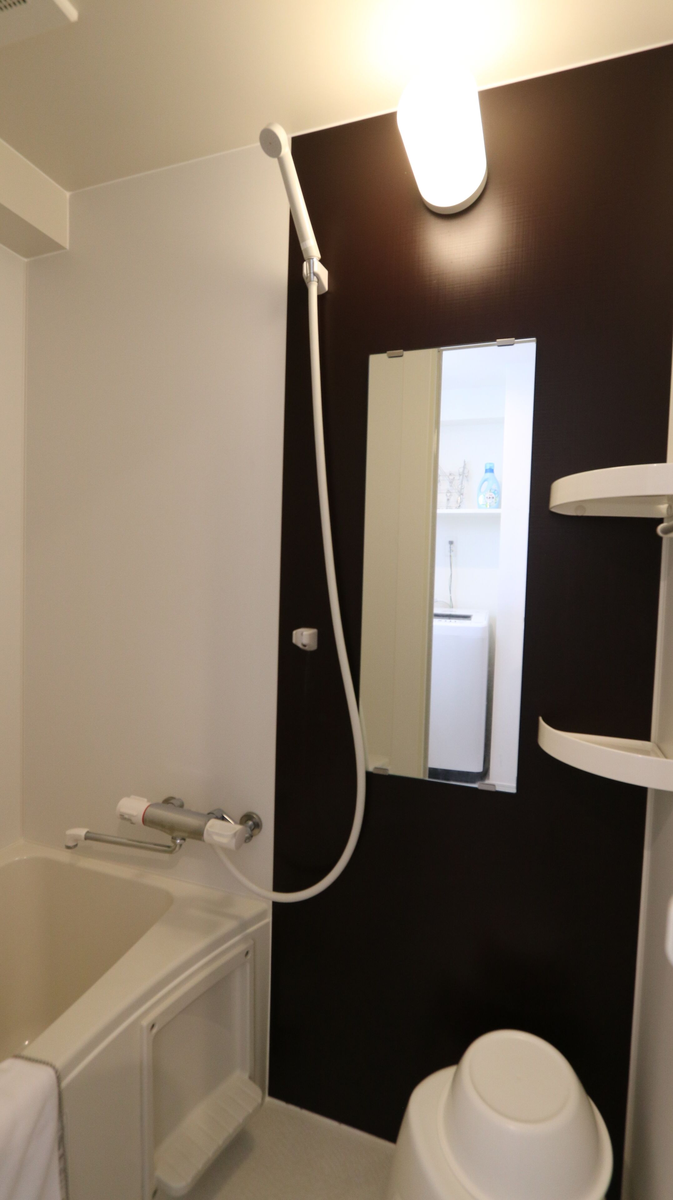 Combined shower/tub, free toiletries, hair dryer, slippers