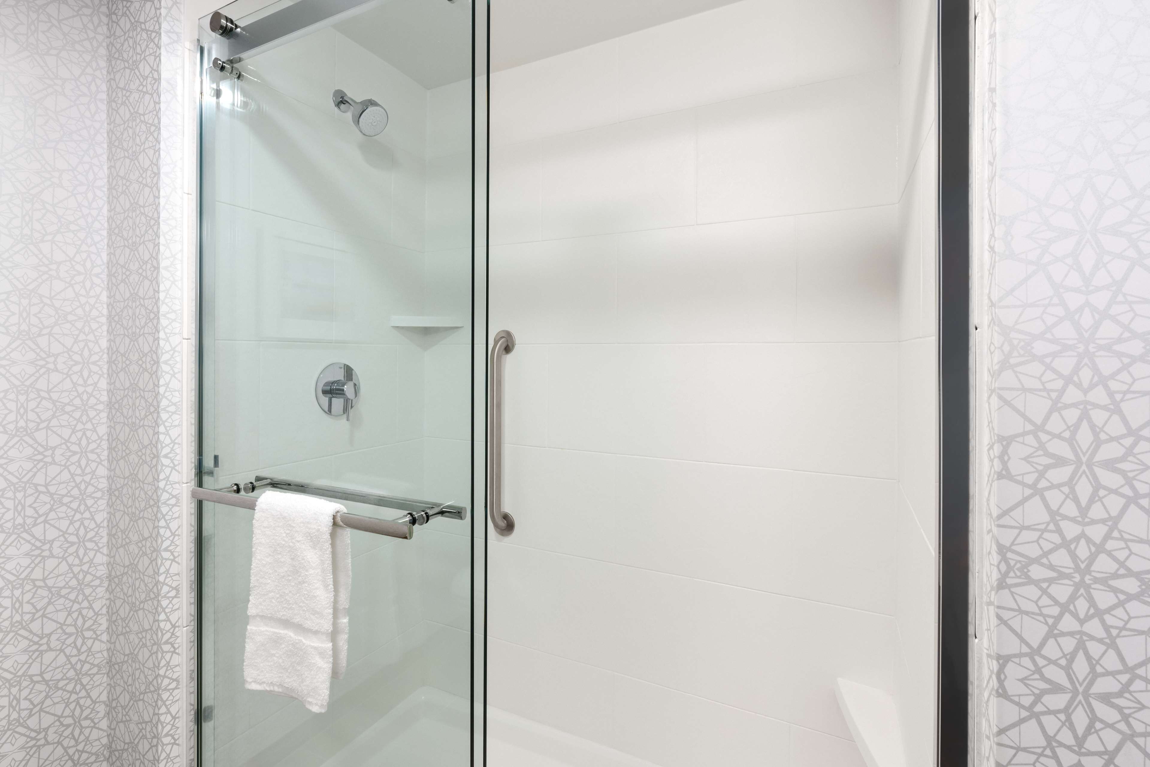 rainfall showerhead, hair dryer, towels