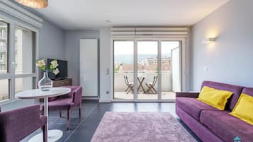 Studio Signature | Area soggiorno | TV a schermo piatto 100 cm con canali digitali, TV