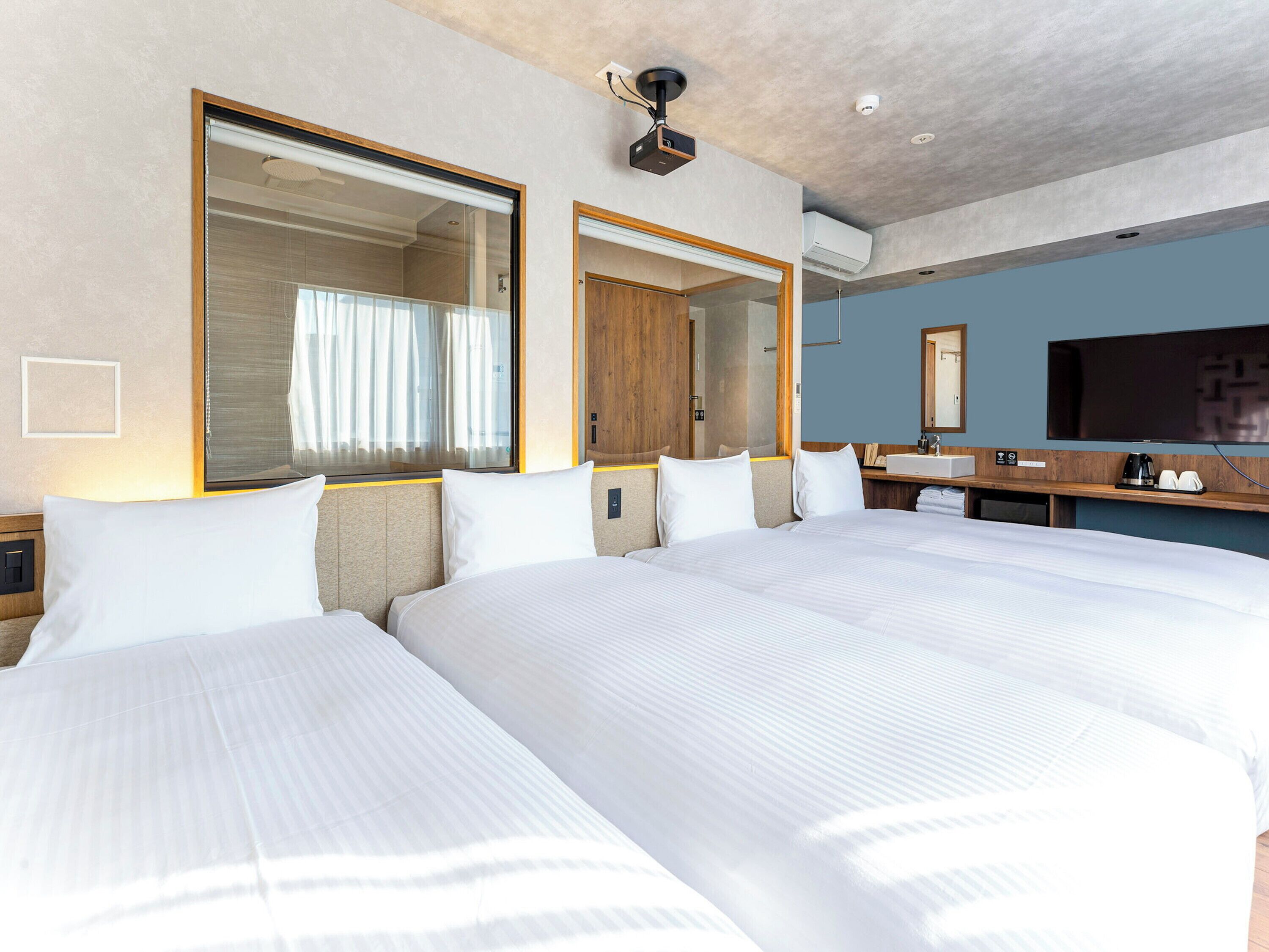 quadruple room | in-room safe, desk, blackout curtains, free wifi