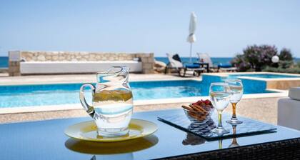 Seafront villa w/ private adults & kids pool, ping pong table & bbq area