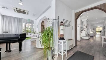 24-inch flat-screen TV with satellite channels, TV