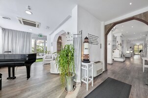 24-inch flat-screen TV with satellite channels, TV