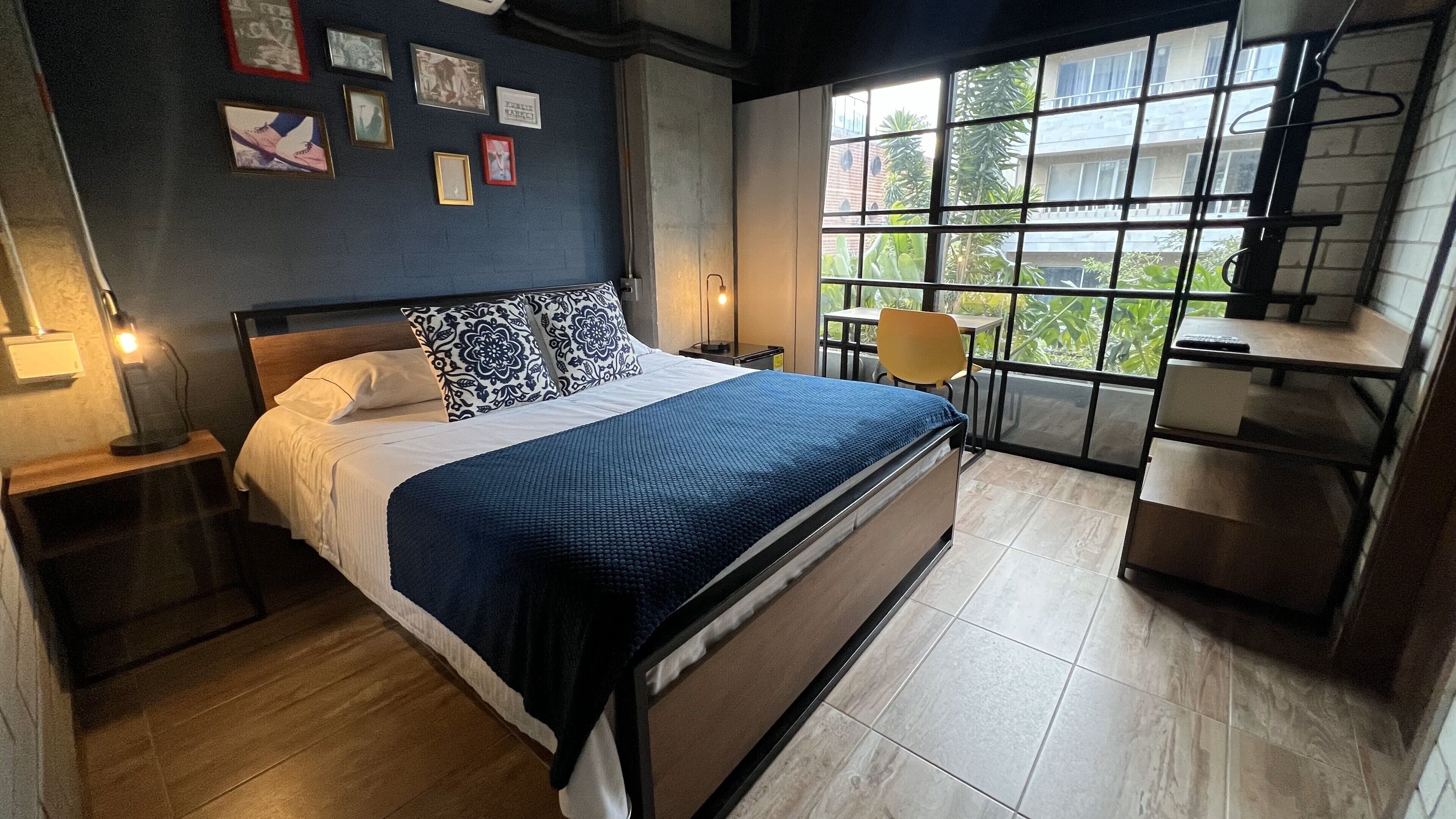 deluxe room | minibar, in-room safe, desk, laptop workspace