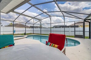 A heated pool, pool loungers